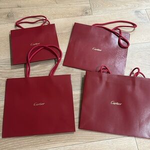 Set of 4 Cartier gift bags